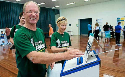 Andrew Fraser, his wife Kerrie and son Angus vote at the Coffs Harbour Showgrounds booth on Saturday. Andrew Fraser, his wife Kerrie and son Angus vote at the Coffs Harbour Showgrounds booth on Saturday.